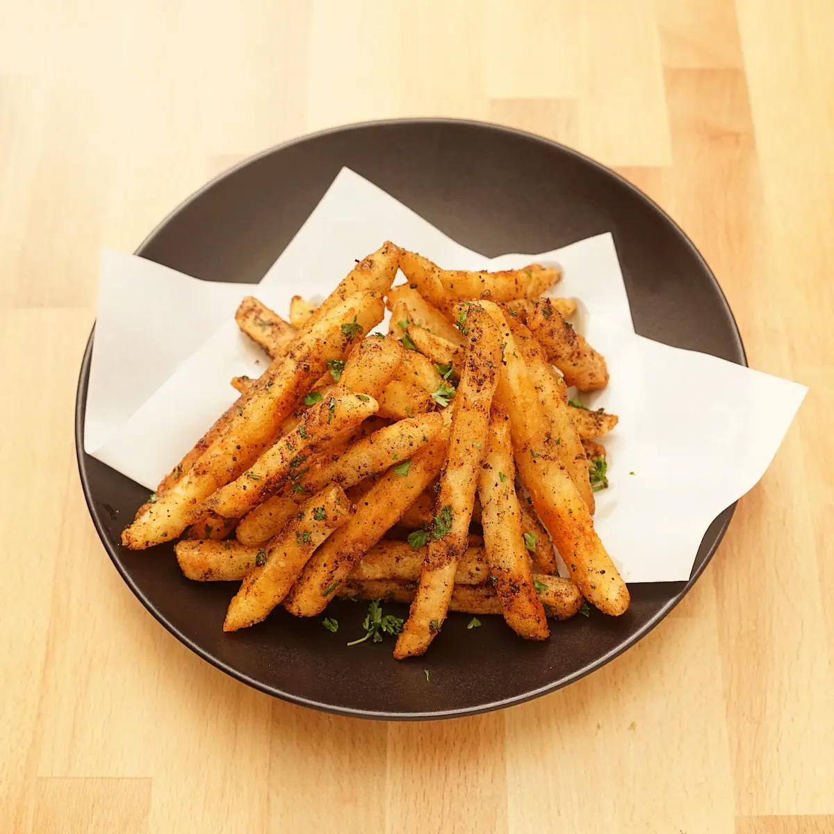 Curry Gachi Fries - French fries tossed in signature burnt garlic oil and curry spices, vegan