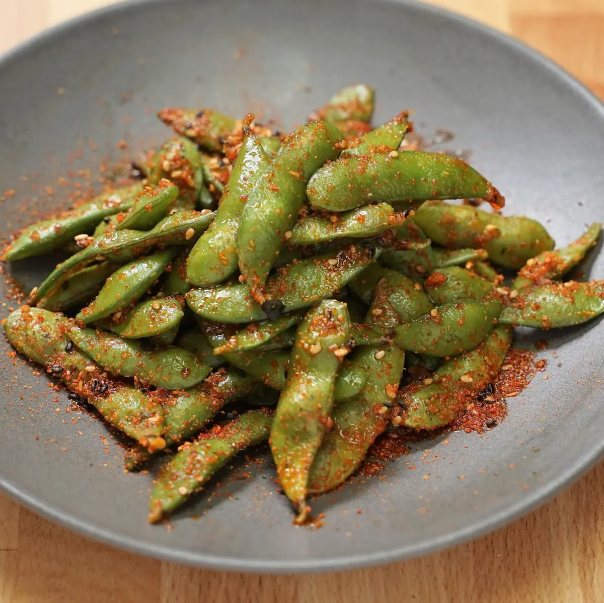Spicy Edamame - Steamed edamame seasoned with lemon zest and Japanese shichimi pepper, vegan and gluten-free
